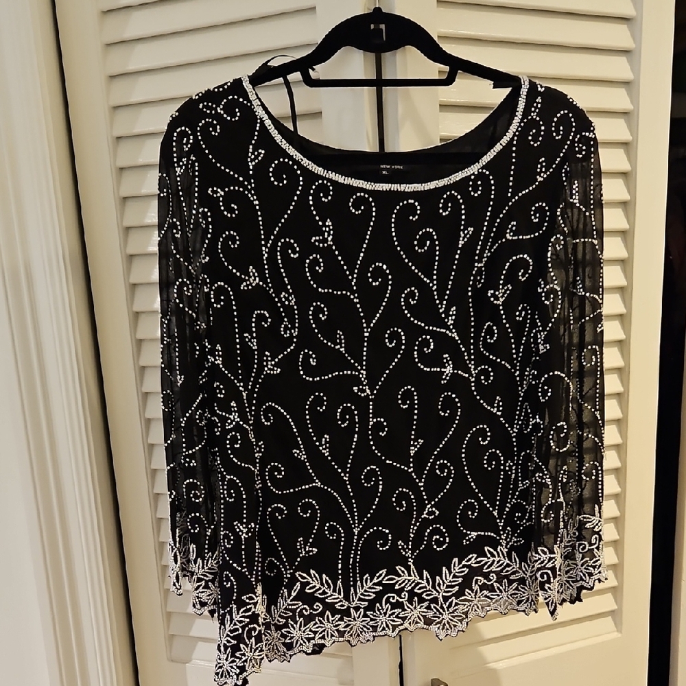 J Kara Black Blouse with Round Neckline and Asymmetrical Embellishments